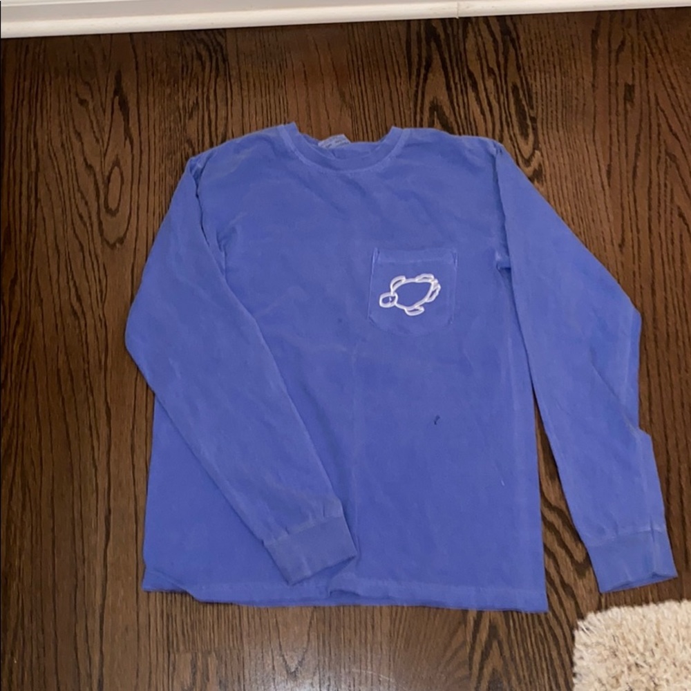 Blue long sleeve shirt.